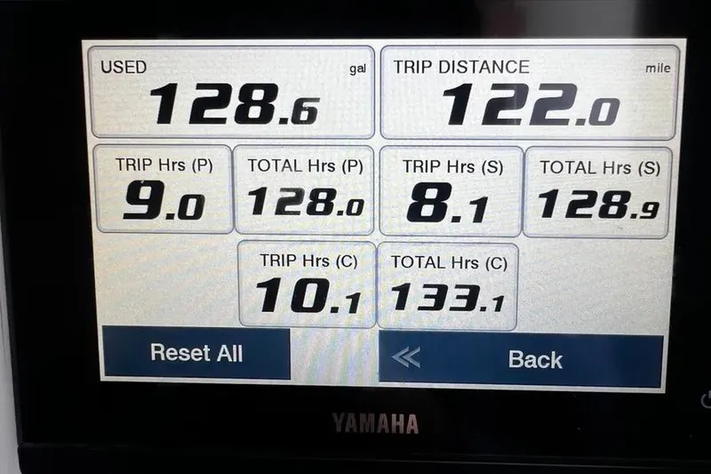 Slide: The Image of Display screen showing fuel usage and trip data for 2025 Contender 39 ST boat. - 18