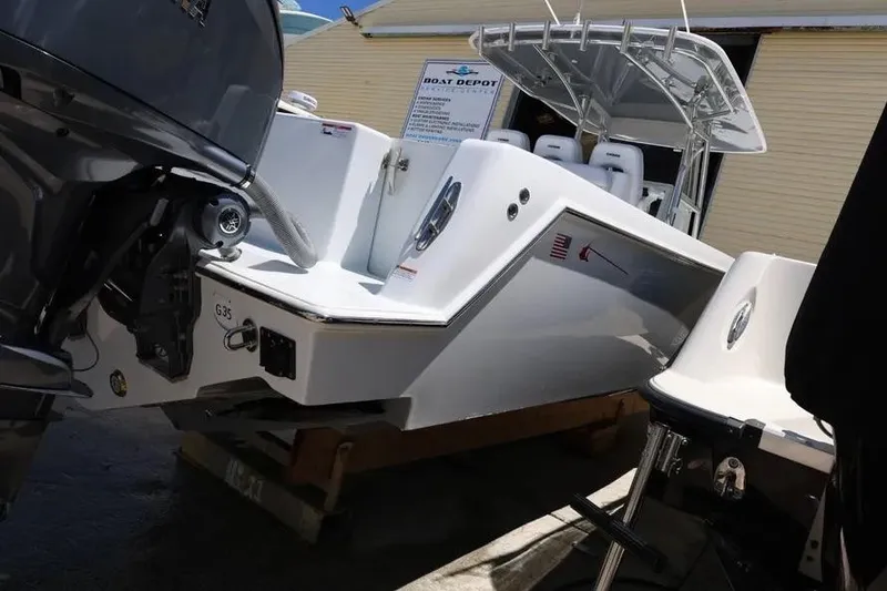 Slide: The Image of 2025 Contender 39 ST boat with powerful outboard motor at Boat Depot. - 4