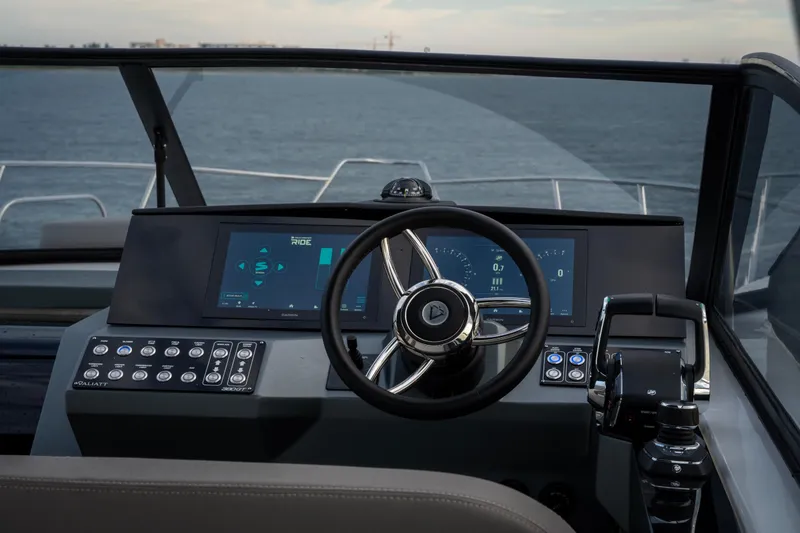Slide: The Image of Helm of 2025 Valiatt 380GT boat with modern controls and digital displays. - 24