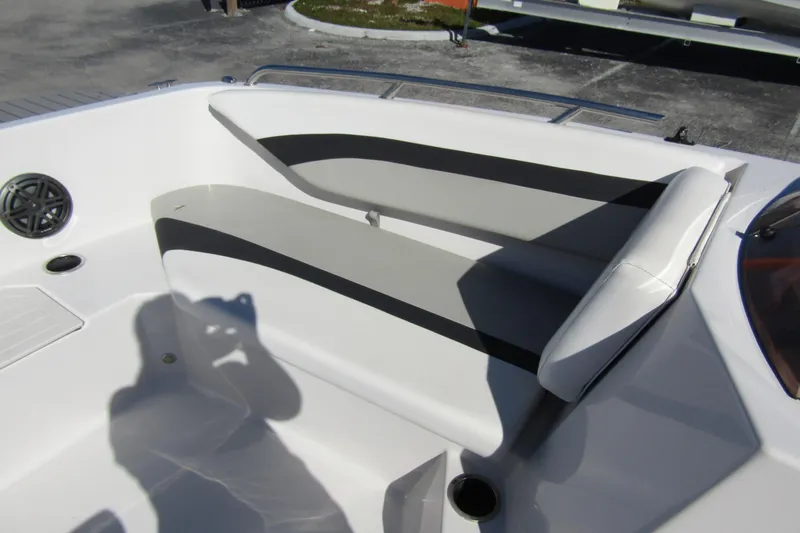 Slide: The Image of 2021 Starcraft SVX 171 OB boat interior with cushioned seating and speaker. - 14