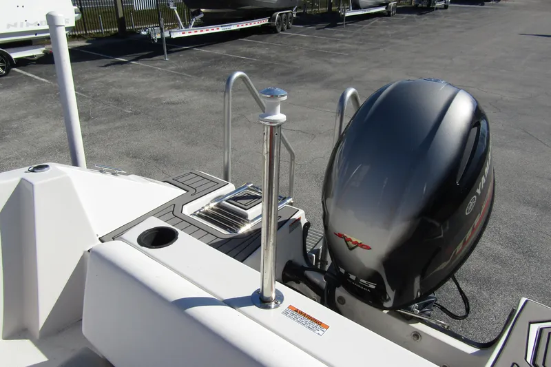 Slide: The Image of 2021 Starcraft SVX 171 OB boat with Yamaha outboard motor, docked on pavement. - 28
