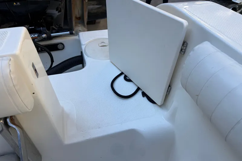 Slide: The Image of Interior of a 2017 Mako 234 Center Console boat. - 17