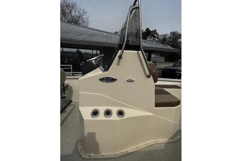 Slide: The Image of 2018 Xpress H20B Bay boat console with steering wheel and seating. - 5