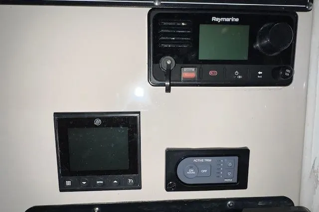 Slide: The Image of Control panel of a 2020 Boston Whaler 250 Outrage with Raymarine electronics. - 14