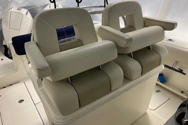 Slide: The Image of 2020 Boston Whaler 250 Outrage boat interior with dual cushioned seats. - 59