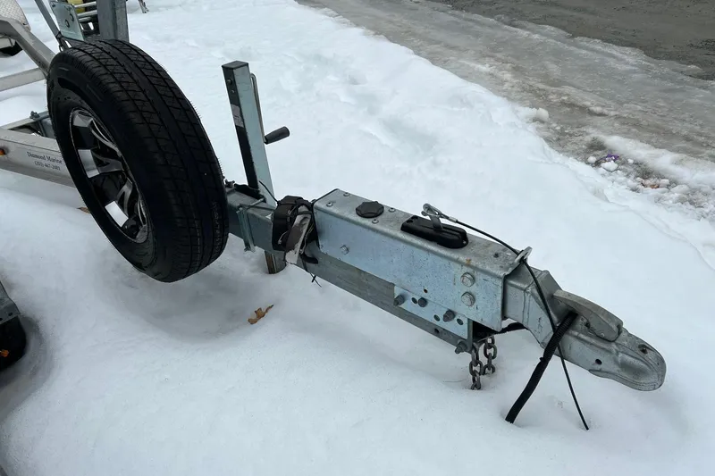 Slide: The Image of Trailer hitch for 2020 Boston Whaler 250 Outrage on snowy ground. - 64
