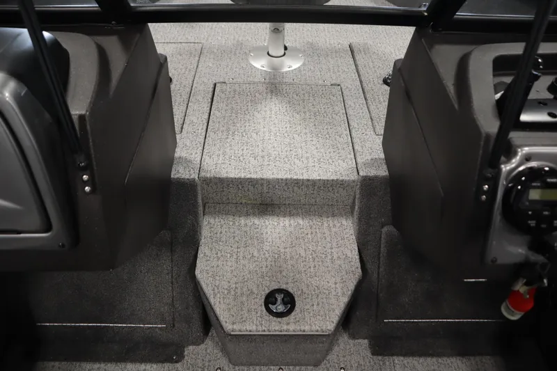 Slide: The Image of 2023 Tracker Pro Guide V-175 WT boat interior with gray carpeted flooring. - 21