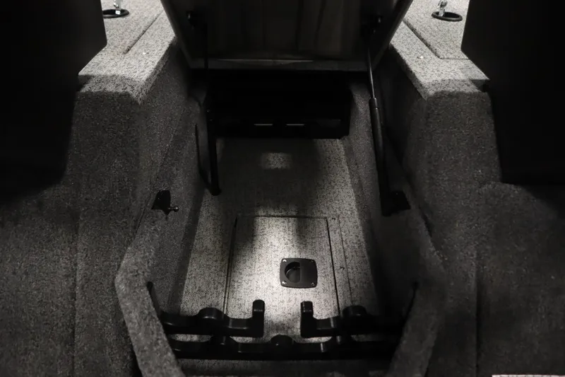 Slide: The Image of 2023 Tracker Pro Guide V-175 WT interior storage compartment, carpeted finish. - 22