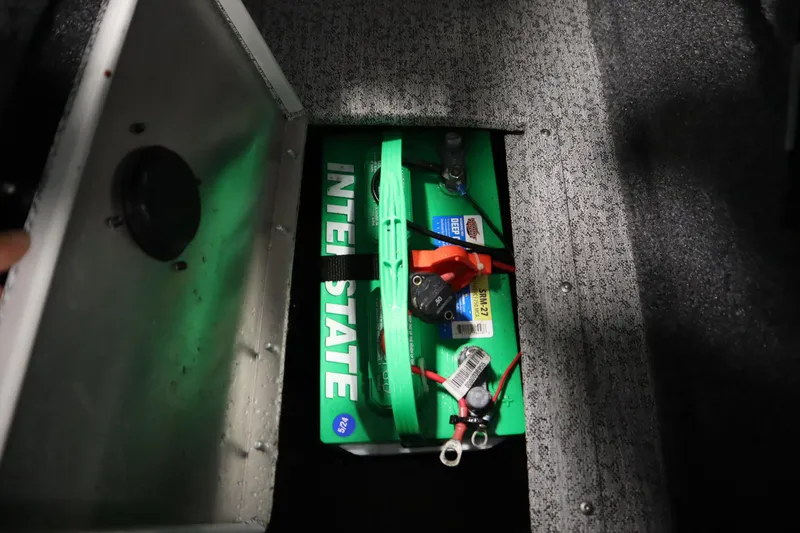 Slide: The Image of Battery compartment of 2023 Tracker Pro Guide V-175 WT boat. - 23