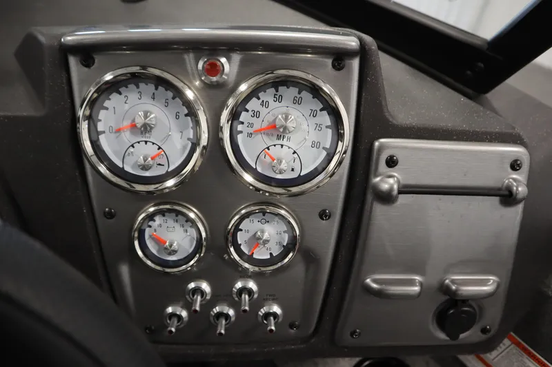 Slide: The Image of Dashboard of 2023 Tracker Pro Guide V-175 WT boat with gauges and controls. - 28