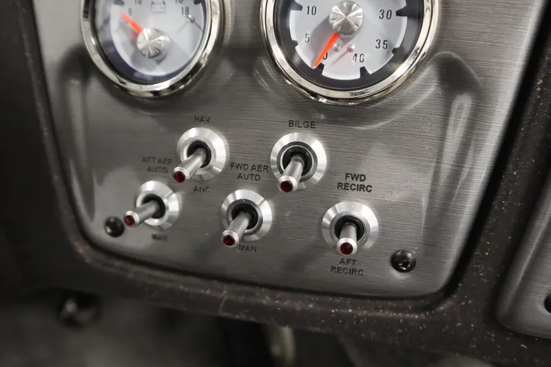 Slide: The Image of Control panel of 2023 Tracker Pro Guide V-175 WT boat with switches and gauges. - 29