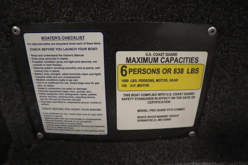 Slide: The Image of 2023 Tracker Pro Guide V-175 WT capacity plate, 6 persons or 838 lbs, safety checklist. - 30