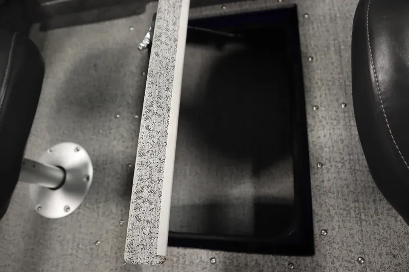 Slide: The Image of 2023 Tracker Pro Guide V-175 WT boat interior with open storage compartment. - 35