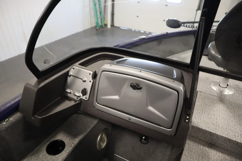 Slide: The Image of 2023 Tracker Pro Guide V-175 WT boat interior with storage compartment and seating. - 36