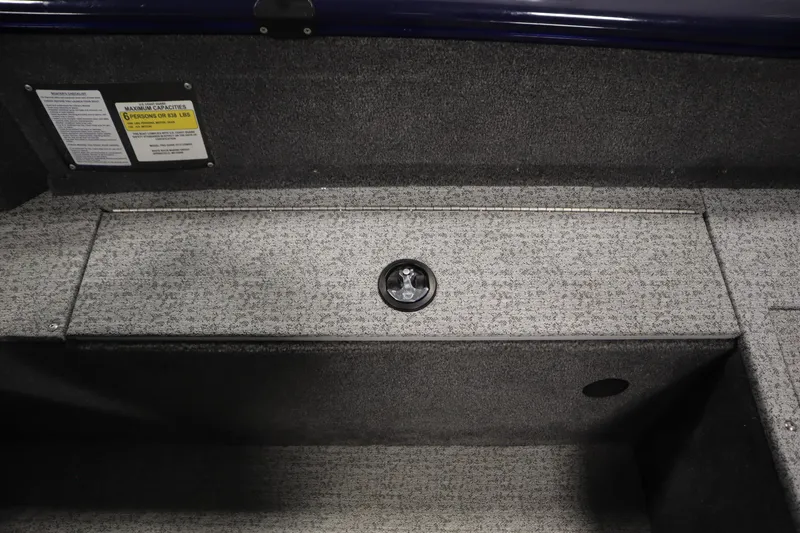 Slide: The Image of 2023 Tracker Pro Guide V-175 WT boat interior with storage compartment and capacity label. - 44