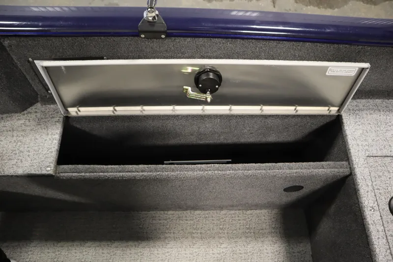 Slide: The Image of 2023 Tracker Pro Guide V-175 WT boat storage compartment with open lid. - 45
