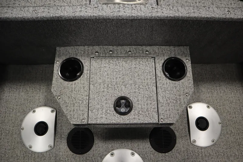 Slide: The Image of 2023 Tracker Pro Guide V-175 WT boat interior with cup holders and storage compartment. - 46