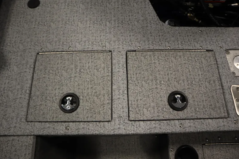Slide: The Image of 2023 Tracker Pro Guide V-175 WT boat storage compartments with secure latches. - 49