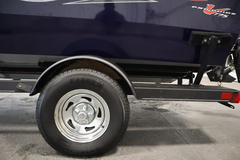 Slide: The Image of 2023 Tracker Pro Guide V-175 WT trailer wheel and fender detail. - 61