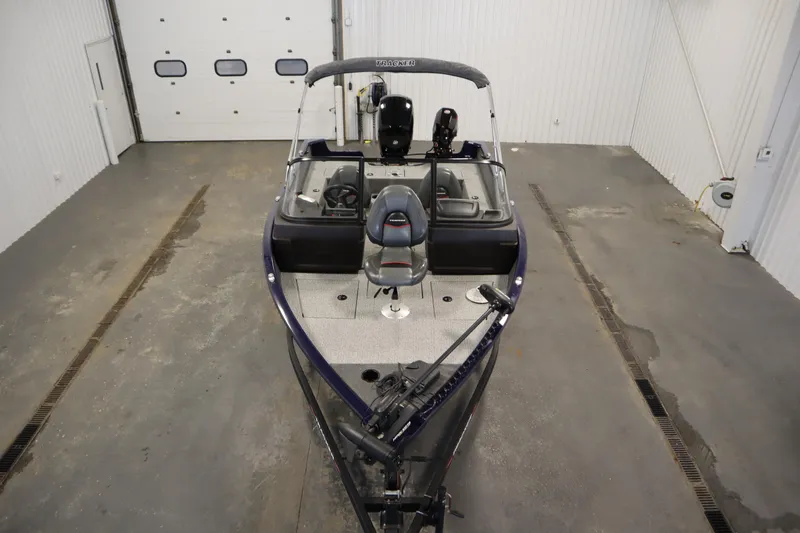 Slide: The Image of 2023 Tracker Pro Guide V-175 WT boat in a garage, top view. - 9