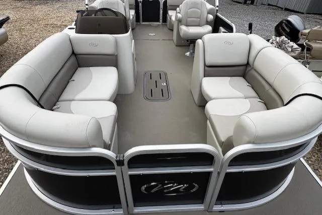 Slide: The Image of 2019 Manitou 23 Aurora LE Standard pontoon boat with spacious seating and modern design. - 11
