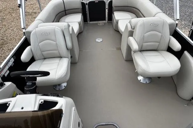 Slide: The Image of 2019 Manitou 23 Aurora LE Standard pontoon boat with spacious seating and modern design. - 6