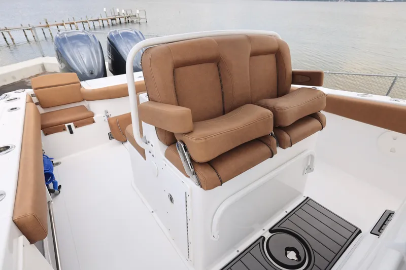 Slide: The Image of 2022 Sea Hunt Gamefish 27 boat with forward seating and dual engines. - 20