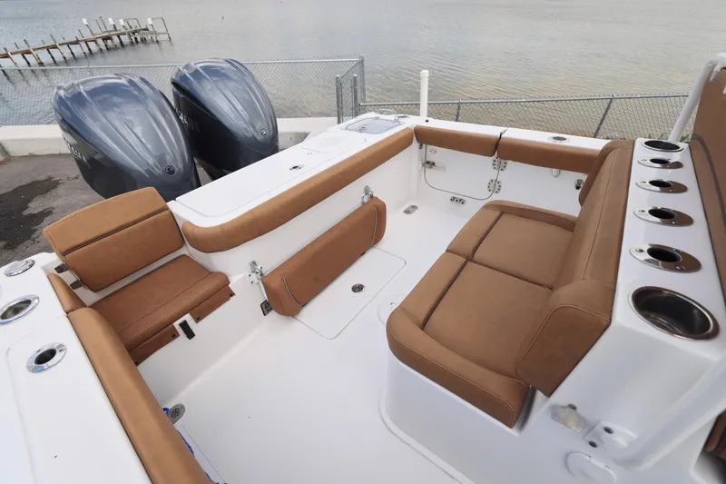 Slide: The Image of 2022 Sea Hunt Gamefish 27 boat with forward seating and dual engines. - 8