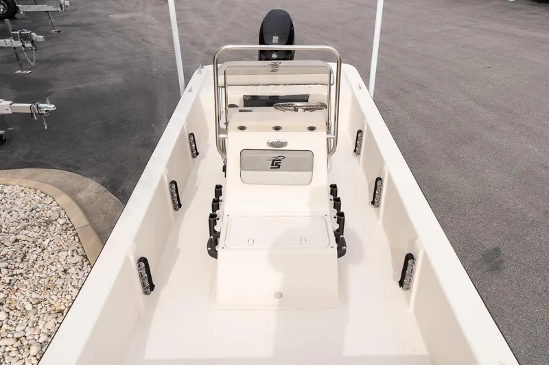 Slide: The Image of 2026 Carolina Skiff E20 JVX CC boat interior with center console and seating. - 13