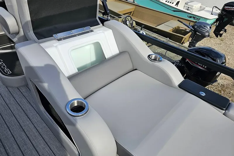 Slide: The Image of SunCatcher Fusion 324SS 2026 boat seat with cup holders and sleek design. - 11