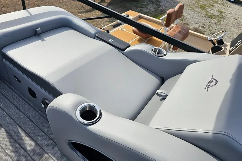Slide: The Image of Luxurious seating on 2026 SunCatcher Fusion 324SS boat with cup holders and sleek design. - 15
