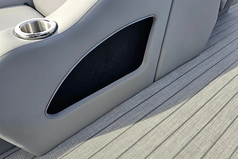 Slide: The Image of Gray interior of 2026 SunCatcher Fusion 324SS boat with cup holder and storage. - 17