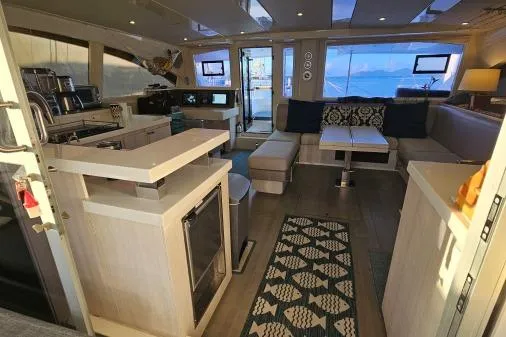 Slide: The Image of Luxurious interior of a 2015 Leopard 48 yacht with modern furnishings and ample seating. - 13