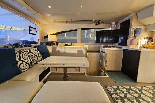 Slide: The Image of Luxurious interior of a 2015 Leopard 48 yacht with modern furnishings and elegant decor. - 16