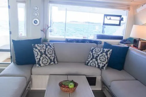 Slide: The Image of Luxurious interior of 2015 Leopard 48 yacht with elegant seating and ocean view. - 18