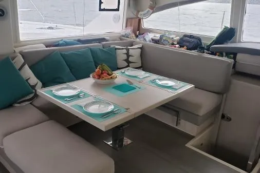 Slide: The Image of Luxurious dining area on a 2015 Leopard 48 yacht with elegant table setting. - 20