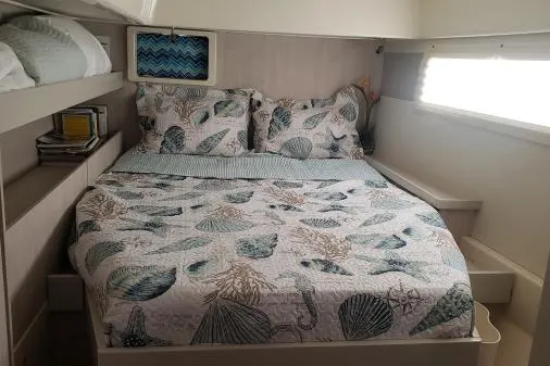 Slide: The Image of Cozy bedroom in 2015 Leopard 48 yacht with seashell-themed bedding. - 28