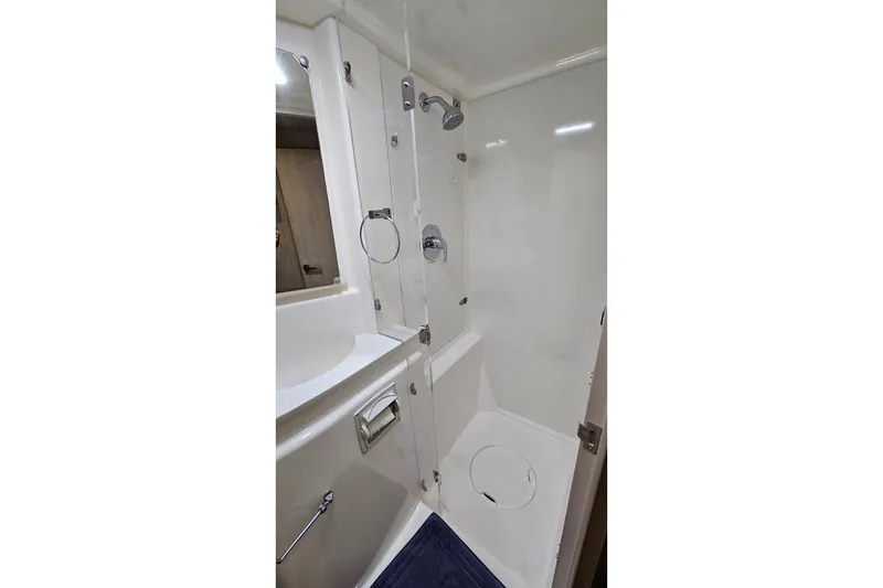 Slide: The Image of Compact bathroom in 2015 Leopard 48 yacht with shower and sink. - 33