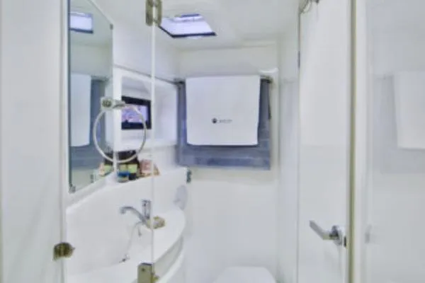 Slide: The Image of Luxurious bathroom interior of 2015 Leopard 48 yacht, featuring modern fixtures and elegant design. - 36