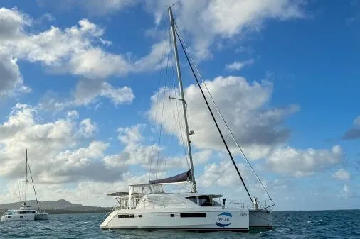 Slide: The Image of Sailing catamaran Leopard 48, 2015 model, on calm ocean under a partly cloudy sky. - 4