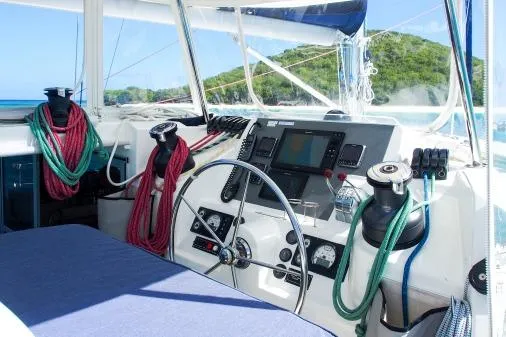 Slide: The Image of 2015 Leopard 48 yacht cockpit with navigation equipment and colorful ropes. - 44