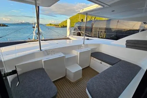 Slide: The Image of Luxury Leopard 48 yacht deck, 2015 model, with scenic ocean view and comfortable seating. - 53