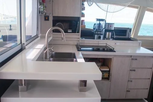 Slide: The Image of Modern kitchen interior on 2015 Leopard 48 yacht with ocean view. - 6