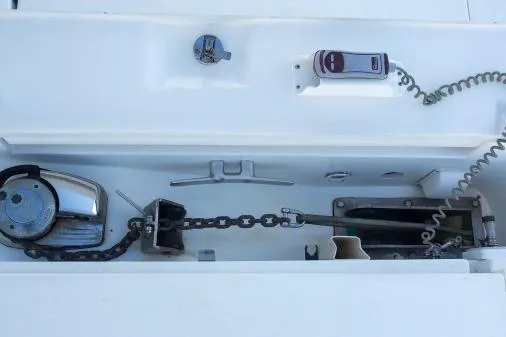 Slide: The Image of Anchor chain mechanism on a 2015 Leopard 48 yacht deck. - 67