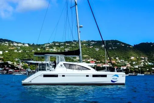 Slide: The Image of 2015 Leopard 48 catamaran sailing in scenic coastal waters. - 71