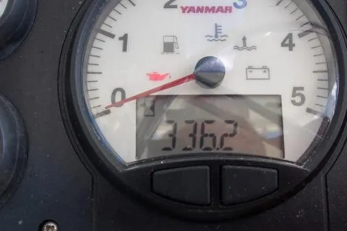 Slide: The Image of Close-up of a Yanmar engine gauge displaying 336.2 hours on a 2015 Leopard 48. - 79
