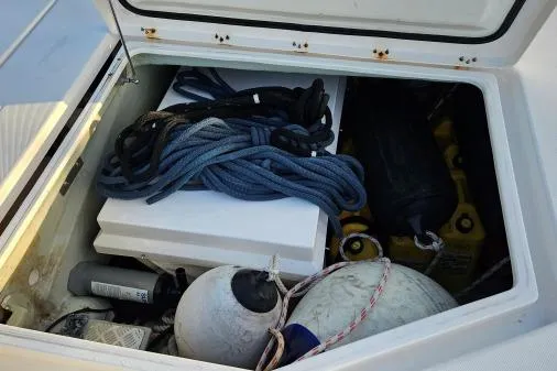 Slide: The Image of Storage compartment on a 2015 Leopard 48 yacht with ropes and marine equipment. - 83