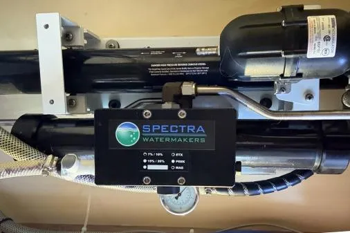 Slide: The Image of Spectra Watermakers system in a 2015 Leopard 48 yacht, featuring control panel and components. - 95
