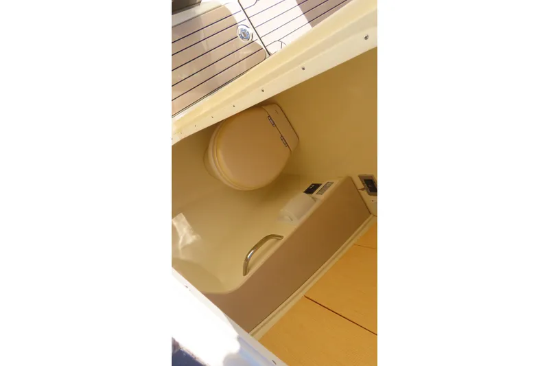 Slide: The Image of 2018 Chris Craft Launch 34 interior cabin with toilet and wooden flooring. - 21