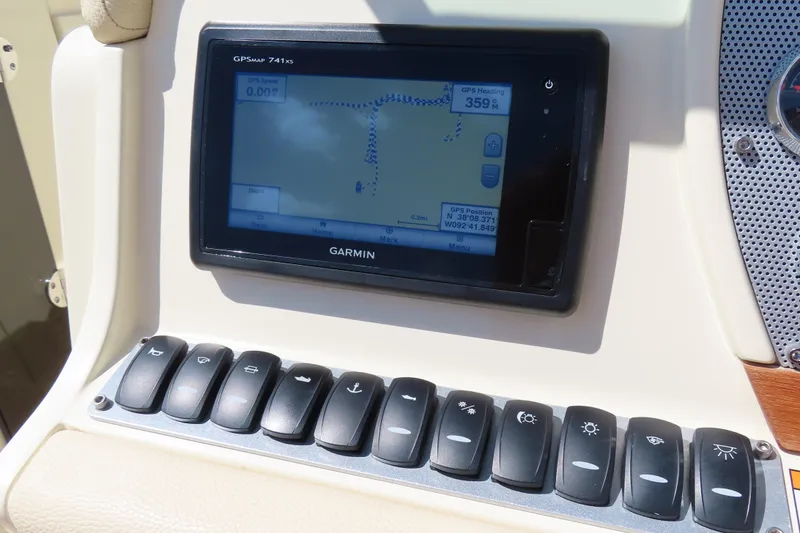 Slide: The Image of Garmin GPS display and control panel on 2018 Chris Craft Launch 34 boat. - 33